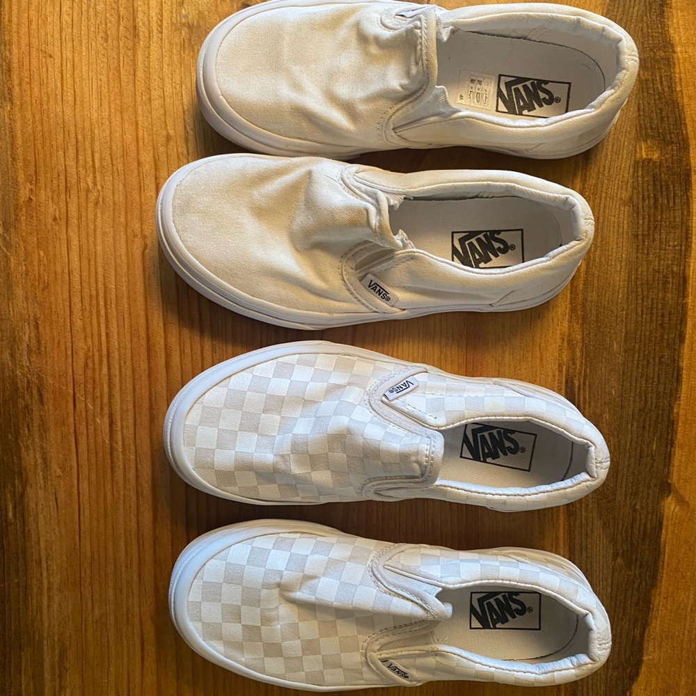 2 pair of white vans shoes